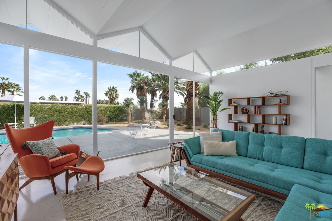 290 East Simms Road Palm Springs, CA 92262 - Photo 18 of 37 a living room with furniture and a floor to ceiling window