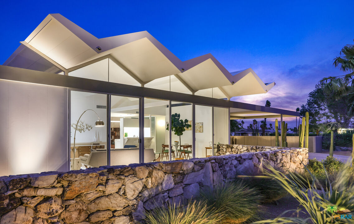 290 East Simms Road Palm Springs, CA 92262 - Photo 2 of 37 a room with lots of trees and glass door