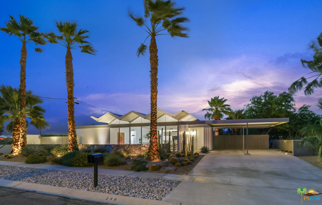 290 East Simms Road Palm Springs, CA 92262 - Photo 5 of 37 a front view of a house with a yard and potted plants
