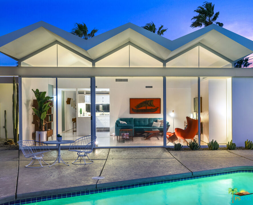 290 East Simms Road Palm Springs, CA 92262 - Photo 7 of 37 a living room filled with furniture and a flat screen tv