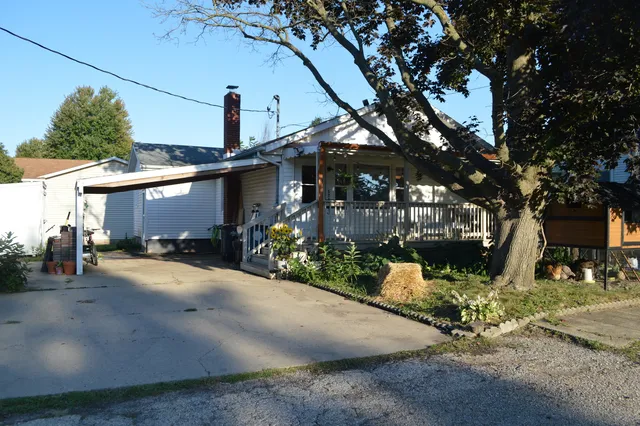 a front view of a house with yard