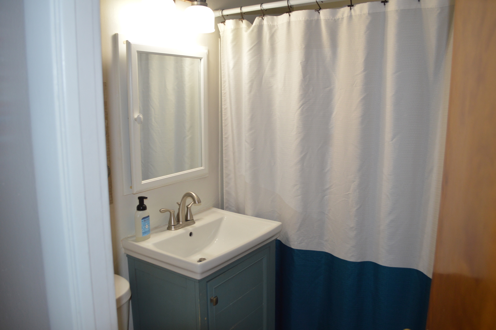 523 North Knox Street Princeton, IL 61356 - Photo 14 of 22 a bathroom with a sink and a mirror