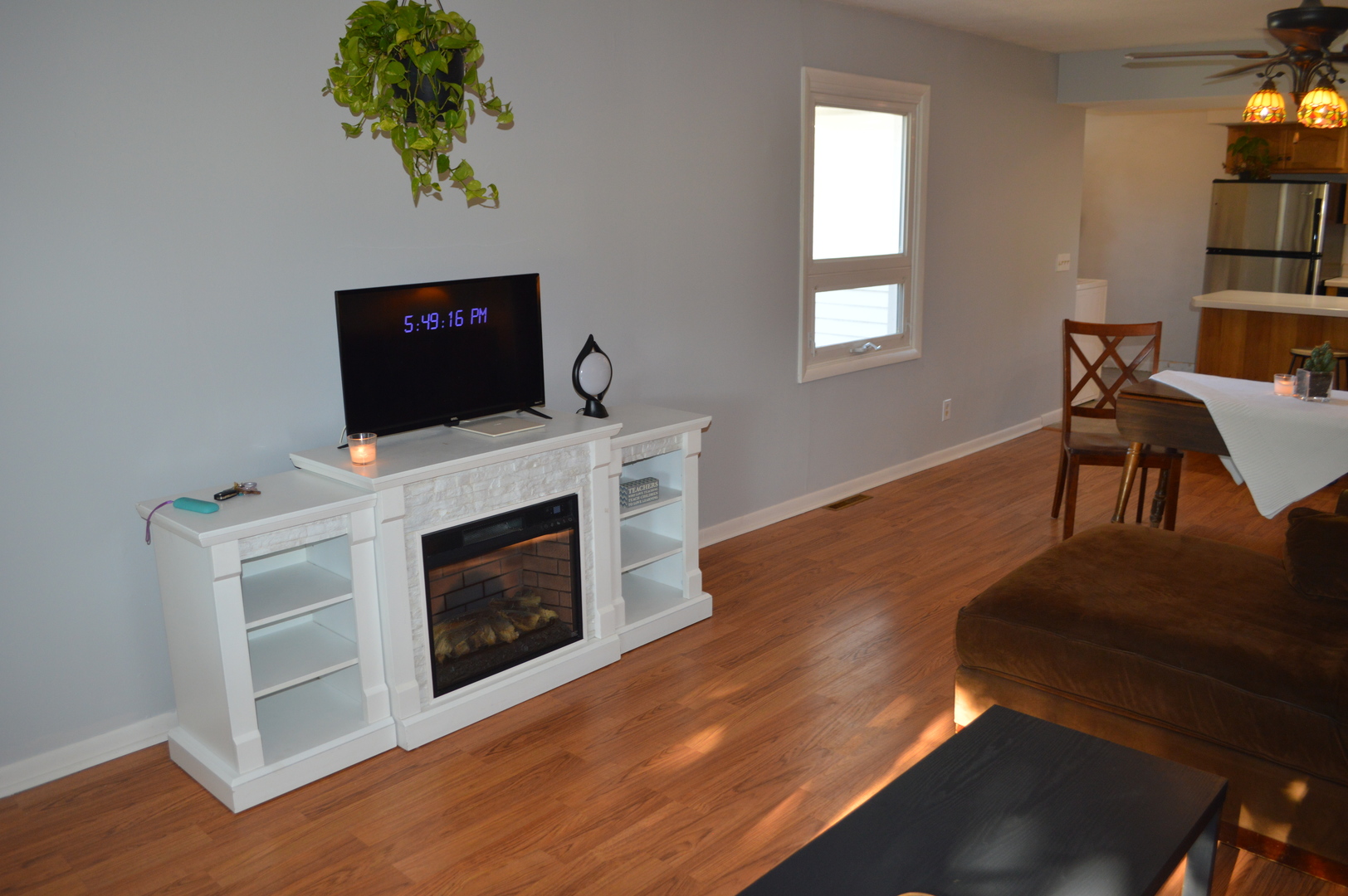 523 North Knox Street Princeton, IL 61356 - Photo 5 of 22 a living room with furniture a fireplace and a window