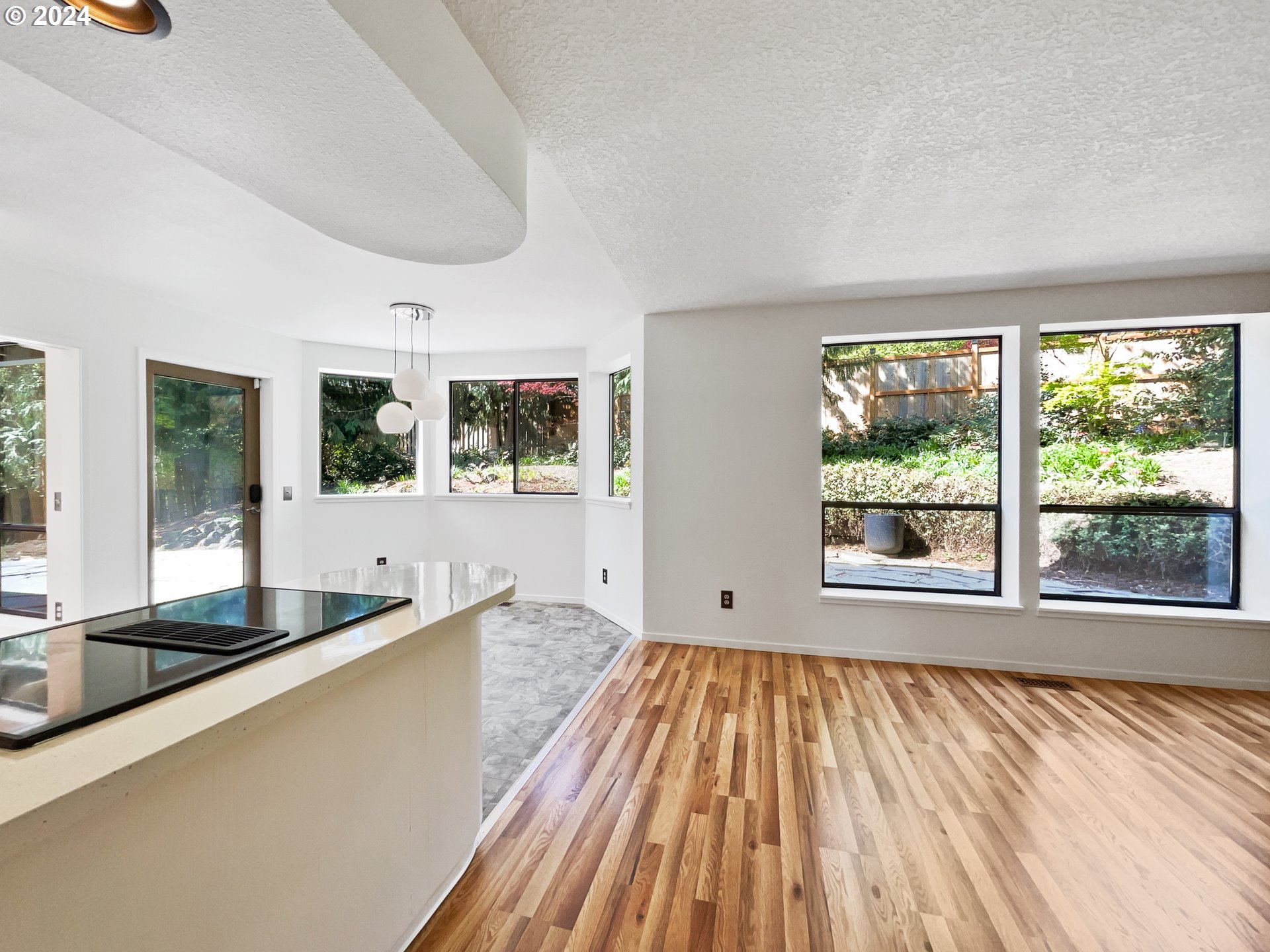 11621 Southwest 43rd Avenue Portland, OR 97219 - Photo 11 of 19 a bathroom with a sink and a large window