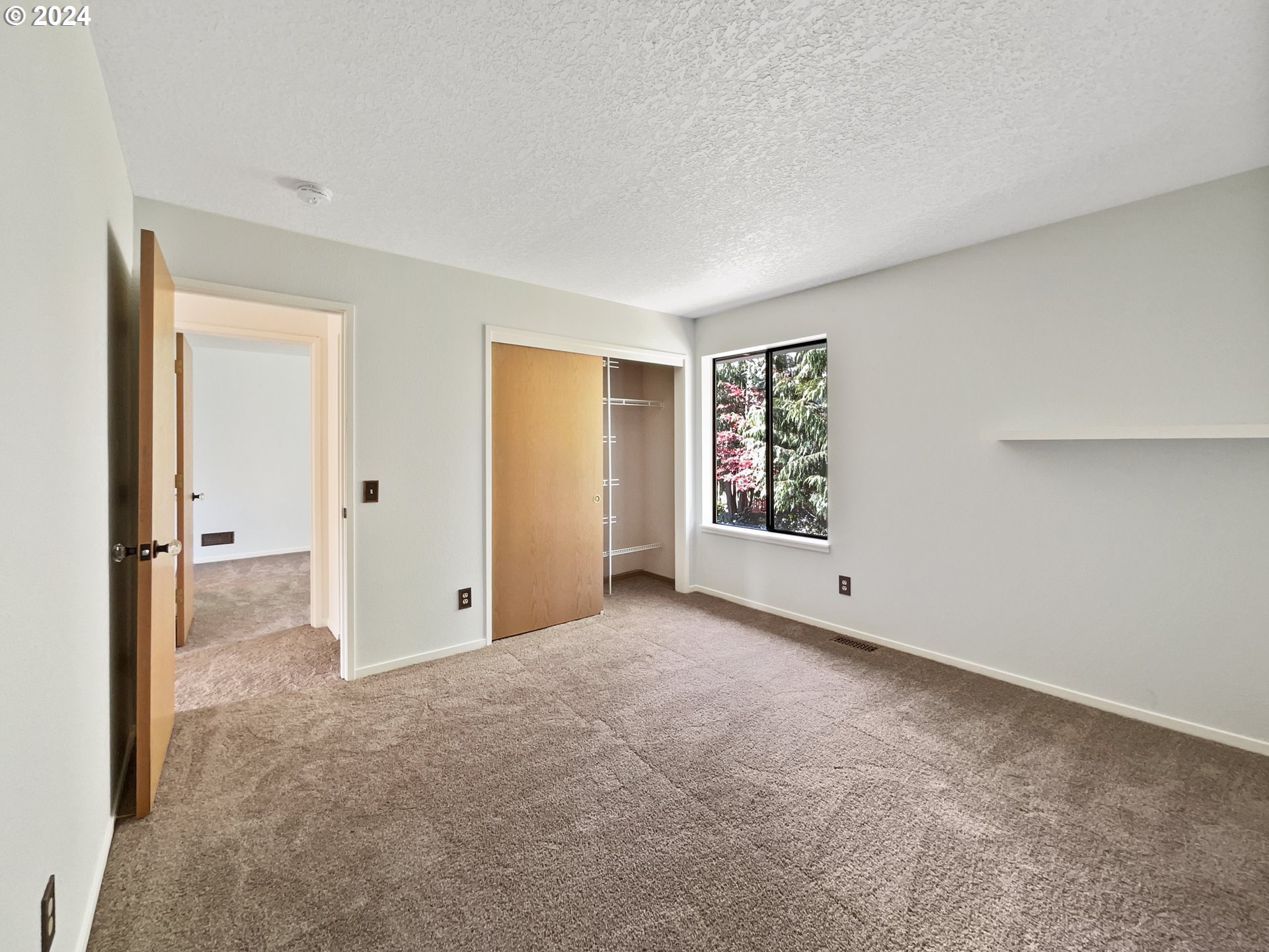 11621 Southwest 43rd Avenue Portland, OR 97219 - Photo 15 of 19 an empty room with windows