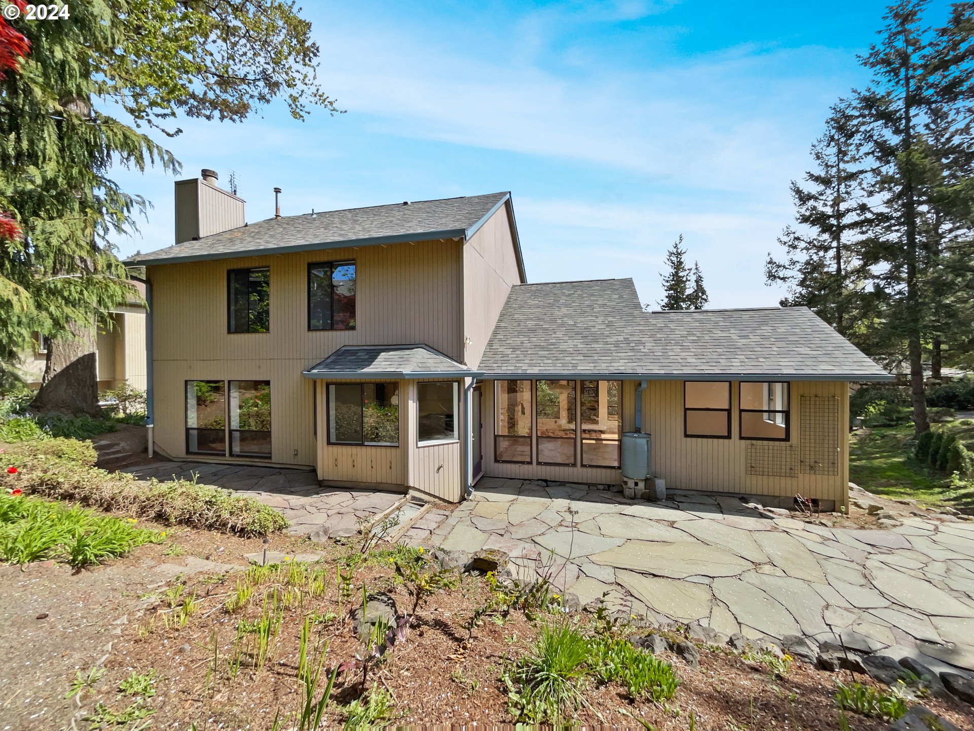 11621 Southwest 43rd Avenue Portland, OR 97219 - Photo 19 of 19 a front view of a house with a yard