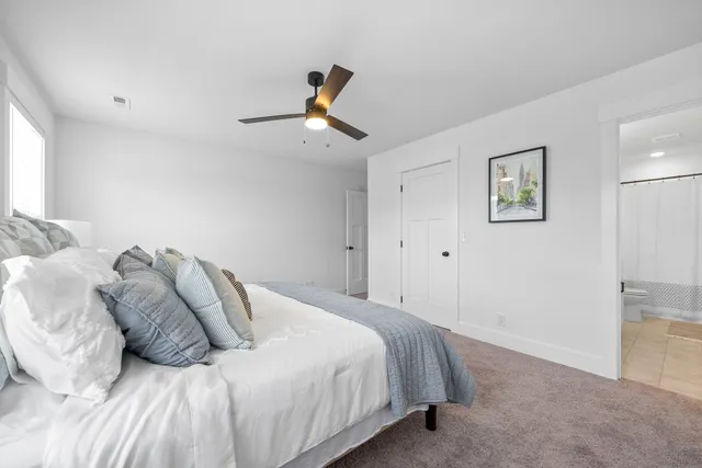 a bathroom with a sink toilet a bathtub and a vanity