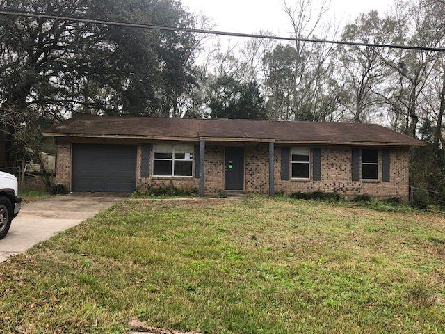 19 Jacks Branch Road Cantonment, FL 32533 - Photo 1 of 1 a backyard of a house with seating space