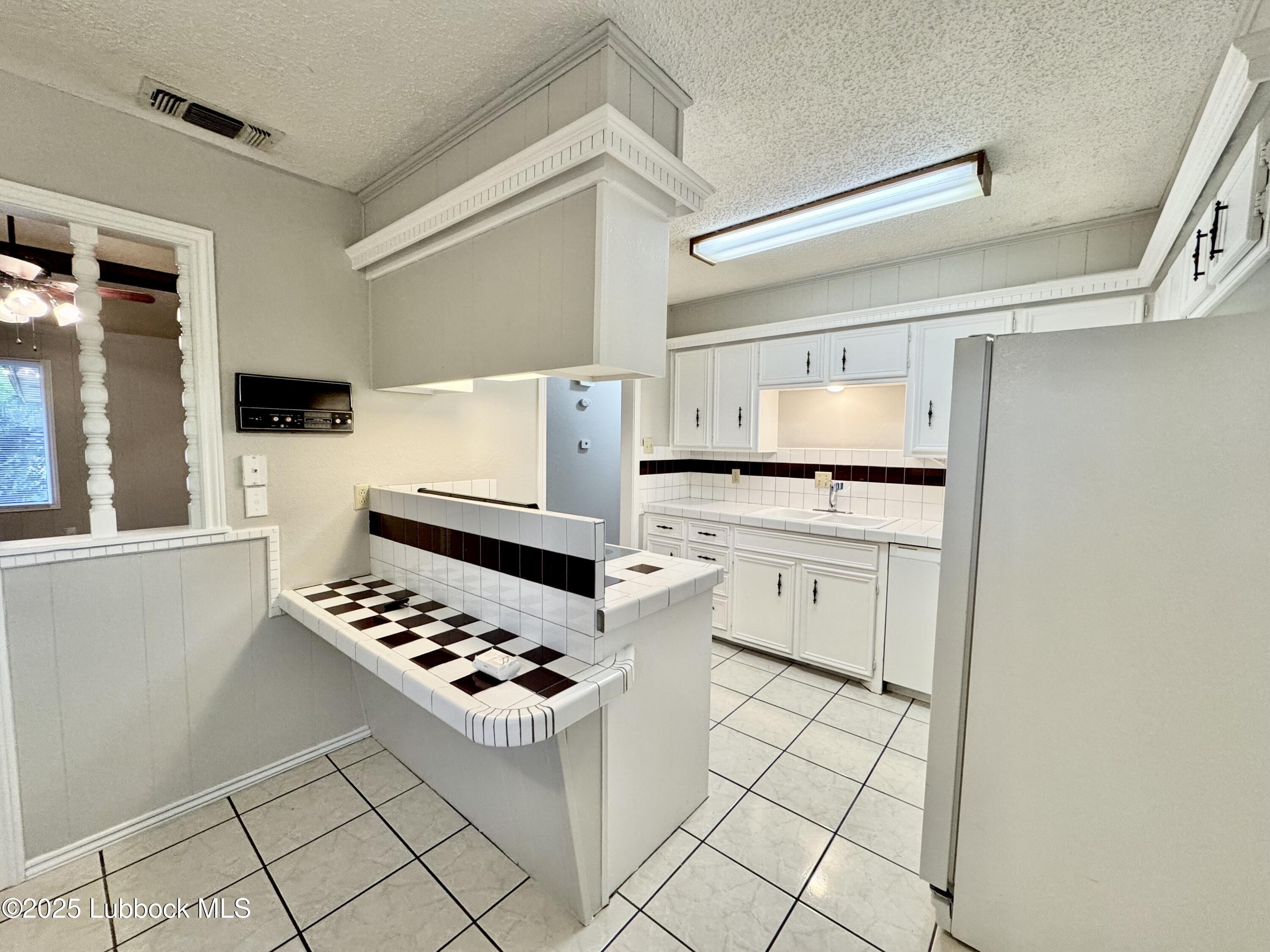 4409 75th Drive, Unit B Lubbock, TX 79424 - Photo 5 of 14 Photo May 16 2025, 7 52 17 AM