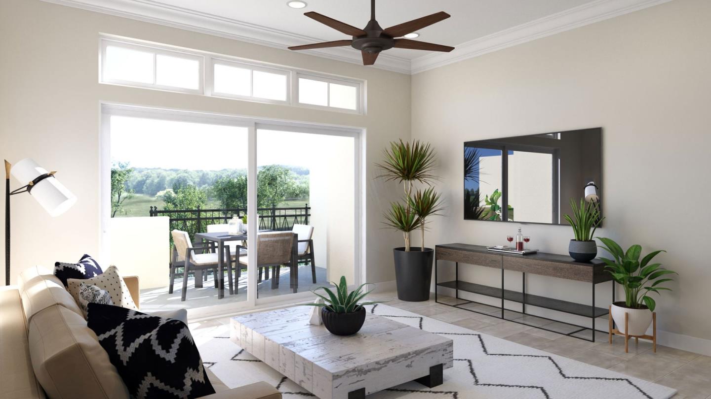 2016 West Middlefield Road Mountain View, CA 94043 - Photo 6 of 10 a living room with furniture a large window and a potted plant