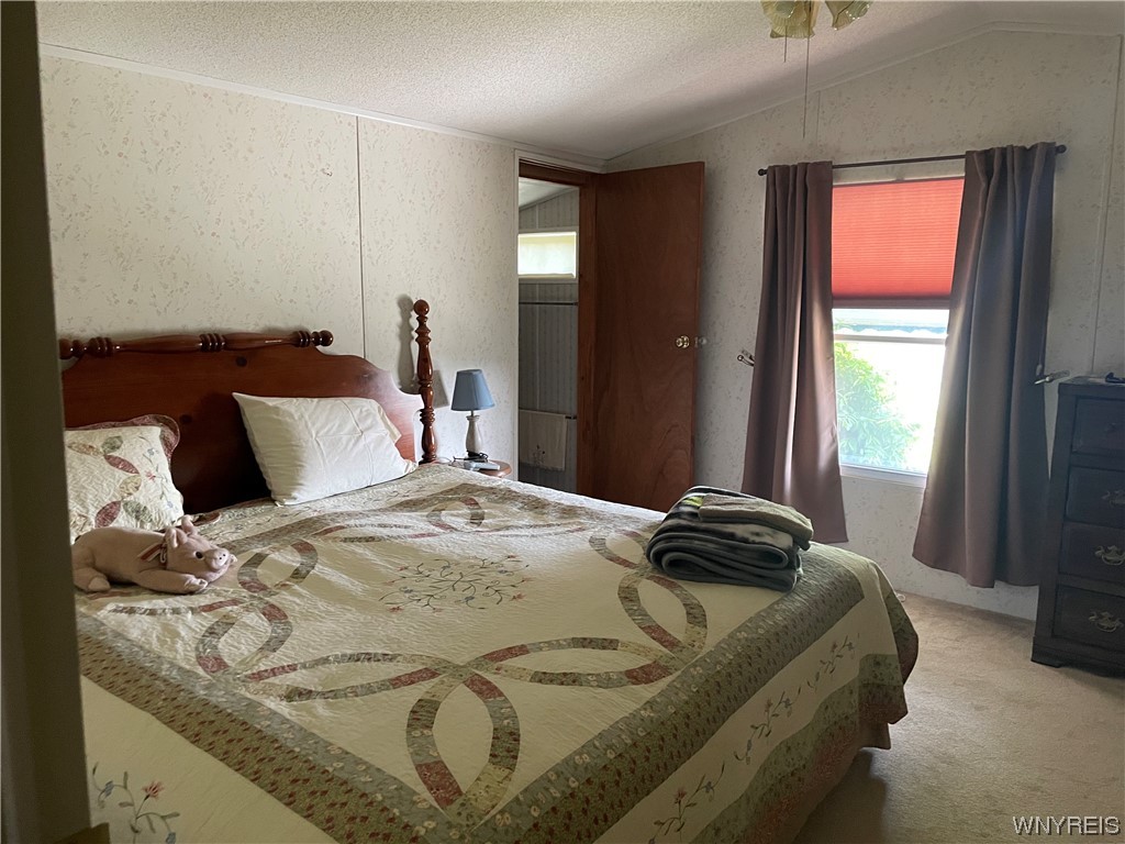 3926 Lockport Olcott Road, Unit 108 Lockport, NY 14094 - Photo 15 of 19 Main Bedroom