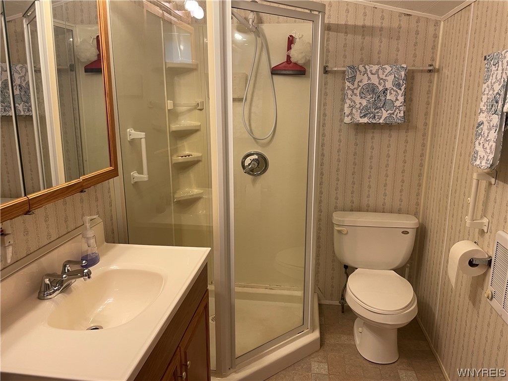 3926 Lockport Olcott Road, Unit 108 Lockport, NY 14094 - Photo 17 of 19 Main Bedroom powder room