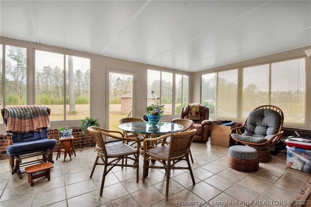 1537 Rice Road Orrum, NC 28369 - Photo 19 of 31 a living room with furniture and a large window