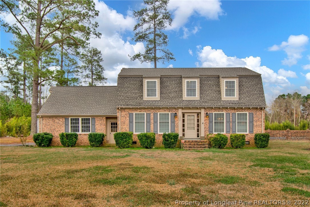 1537 Rice Road Orrum, NC 28369 - Photo 2 of 31 a front view of a house with garden
