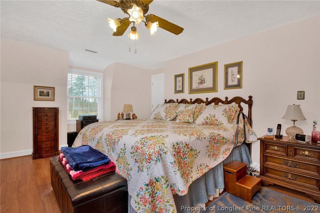 1537 Rice Road Orrum, NC 28369 - Photo 26 of 31 a bedroom with bed and window