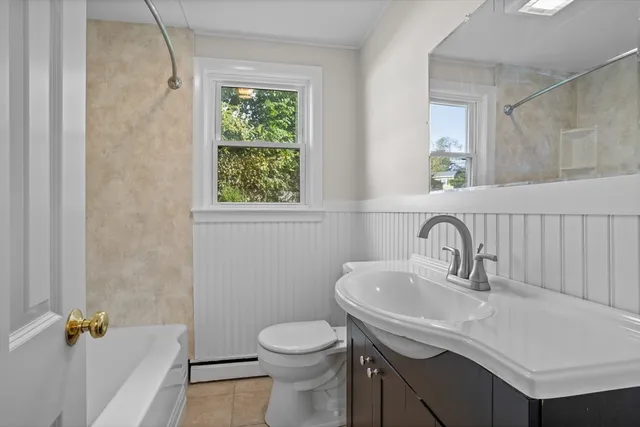 a bathroom with a white bath tub