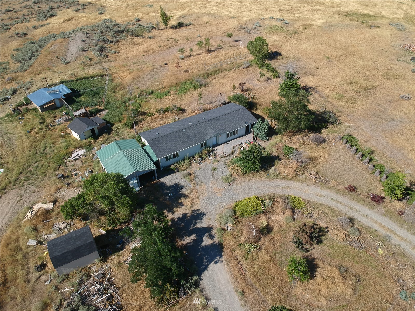 20 Rosewood Lane Riverside, WA 98849 - Photo 2 of 11 an aerial view of a house with a yard