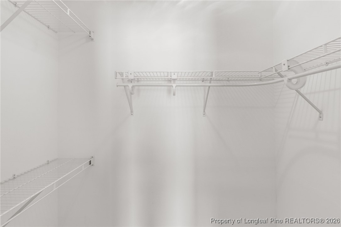 3340 Hunting Bay Drive Spring Lake, NC 28390 - Photo 16 of 28 a view of a room with racks on the wall