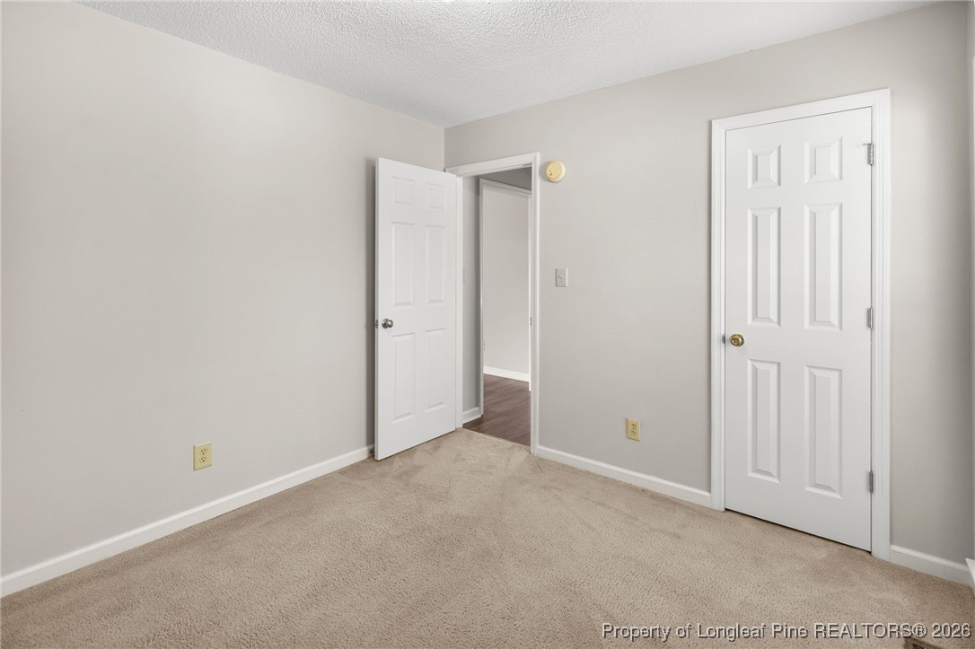 3340 Hunting Bay Drive Spring Lake, NC 28390 - Photo 20 of 28 an empty room with closet area