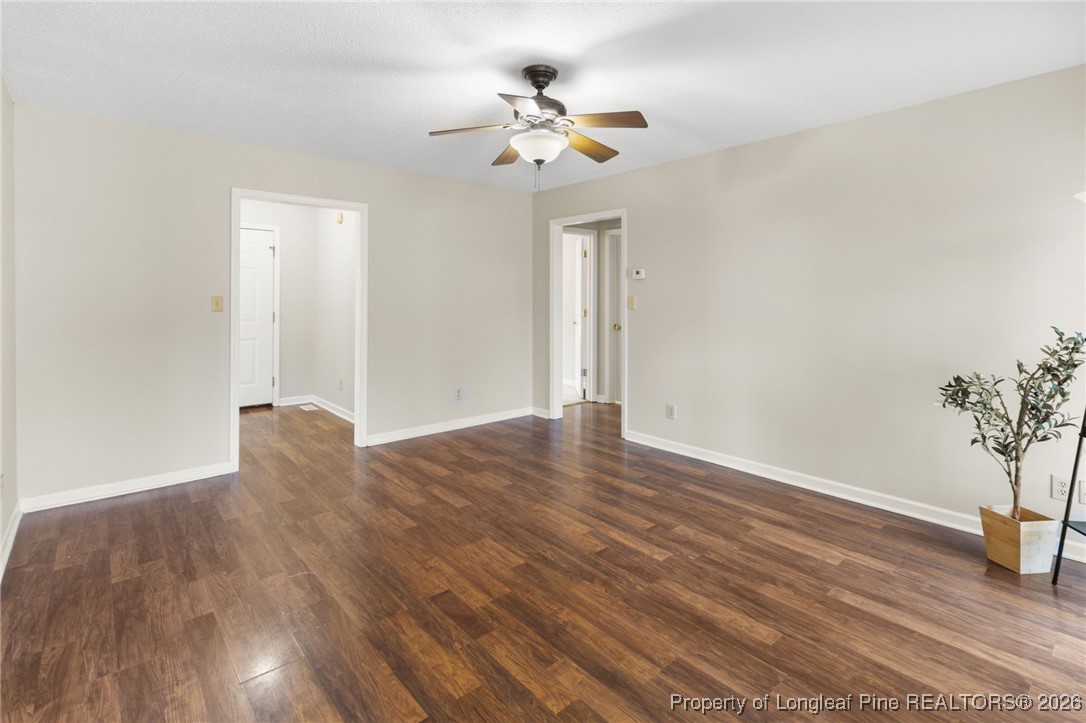 3340 Hunting Bay Drive Spring Lake, NC 28390 - Photo 8 of 28 a view of an empty room with wooden floor