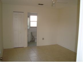 1836 Northeast Cleveland Palm Bay, FL 32905 - Photo 5 of 7 a view of an empty room and window