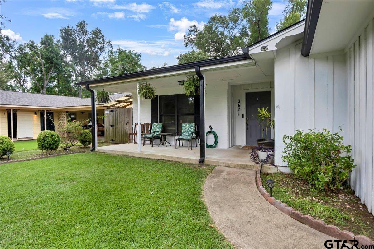 2631 Amy Lane Tyler, TX 75701 - Photo 2 of 26 a front view of a house with garden and patio
