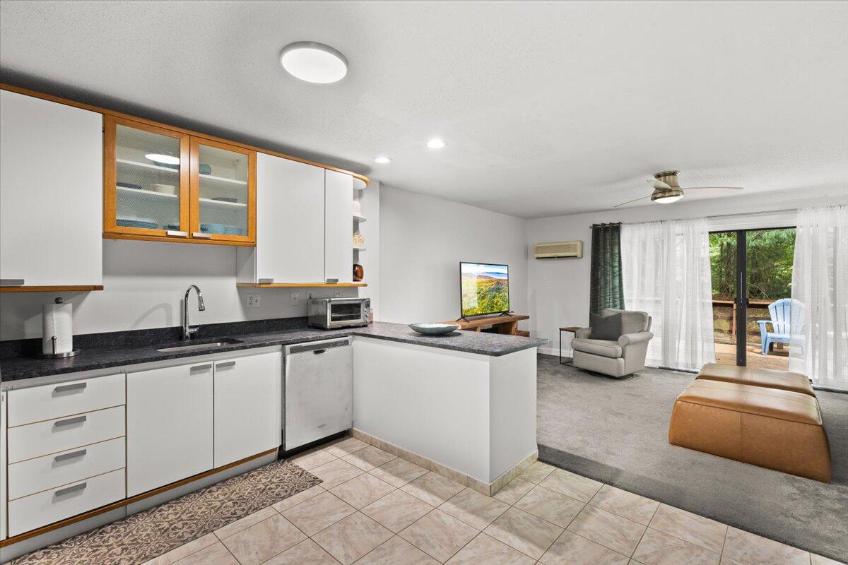 84 Round House Road Bourne, MA 02532 - Photo 13 of 35 a kitchen with sink and cabinets