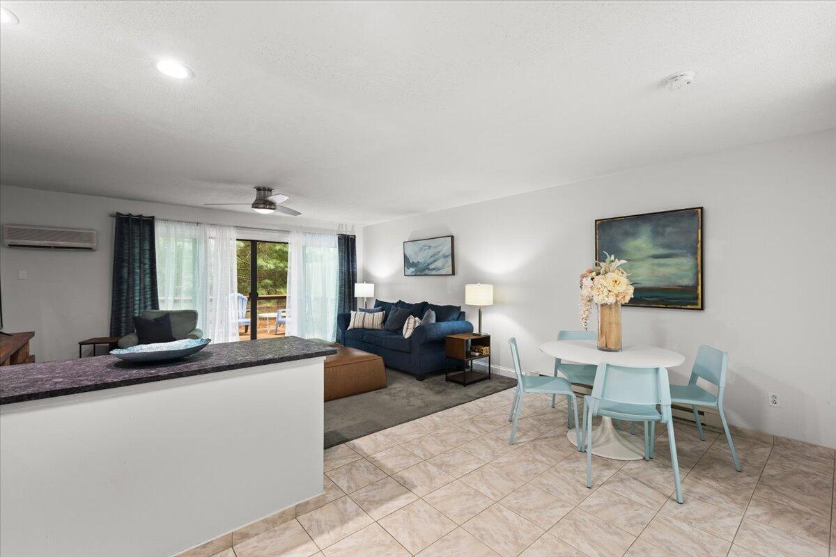 84 Round House Road Bourne, MA 02532 - Photo 17 of 35 a living room with furniture and a large window