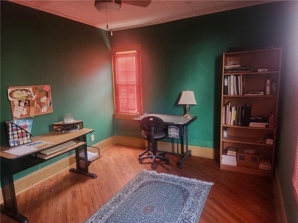 223 Hoeveler Street Springdale, PA 15144 - Photo 8 of 17 a living room with furniture a piano and a window