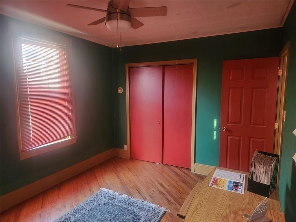 223 Hoeveler Street Springdale, PA 15144 - Photo 9 of 17 a bedroom with a bed and a window