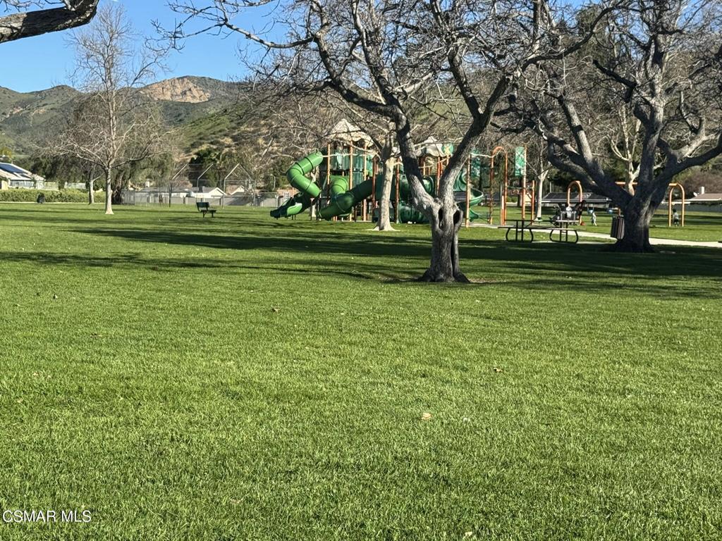 2030 Avenida Placida, Unit 4 Simi Valley, CA 93063 - Photo 18 of 18 a big yard with lots of green space and trees