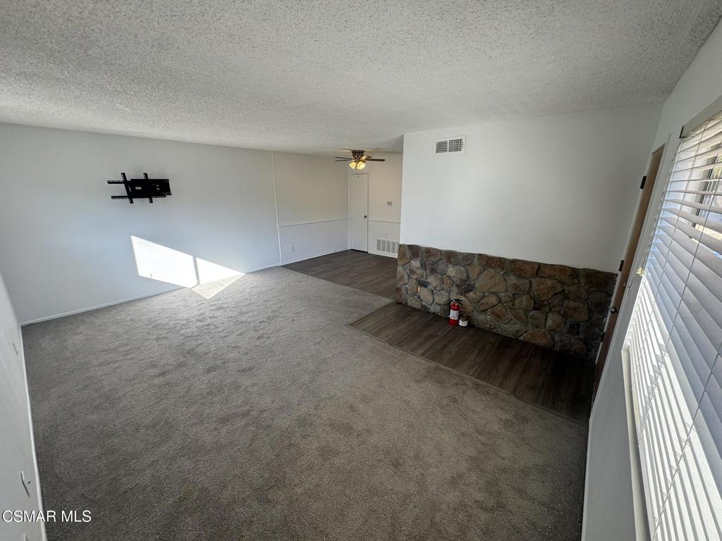 2030 Avenida Placida, Unit 4 Simi Valley, CA 93063 - Photo 2 of 18 a living room with a couch