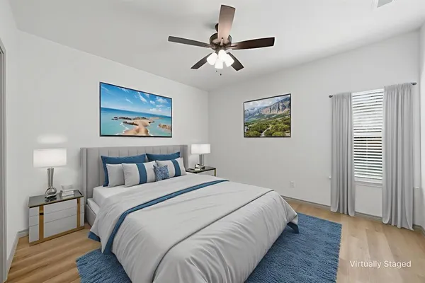 a bed room with bed and a night stand