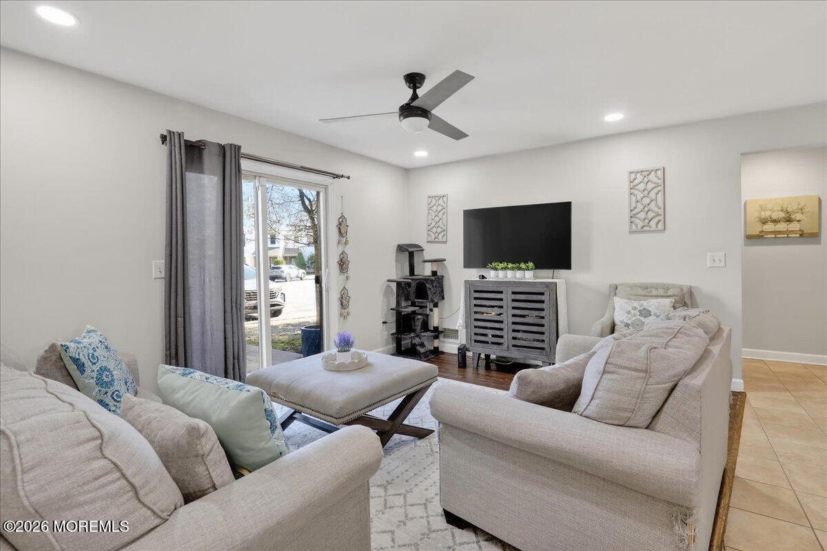 402 Daisy Court Jackson, NJ 08527 - Photo 11 of 44 a living room with furniture and a flat screen tv