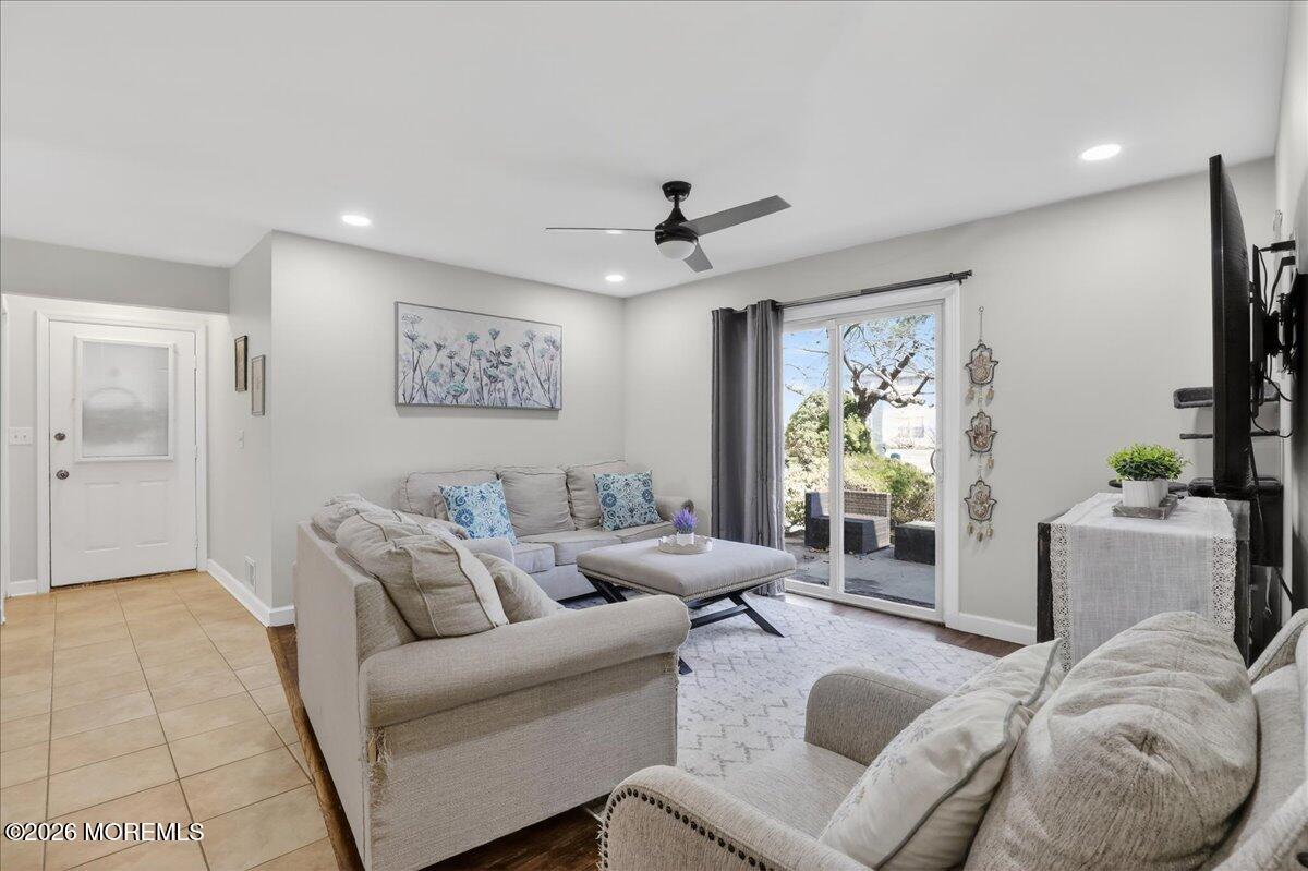 402 Daisy Court Jackson, NJ 08527 - Photo 12 of 44 a living room with furniture and a large window