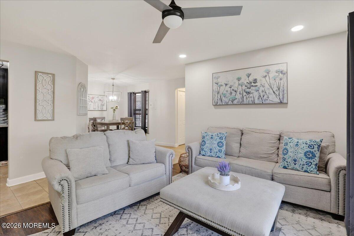 402 Daisy Court Jackson, NJ 08527 - Photo 14 of 44 a living room with furniture and a view of kitchen