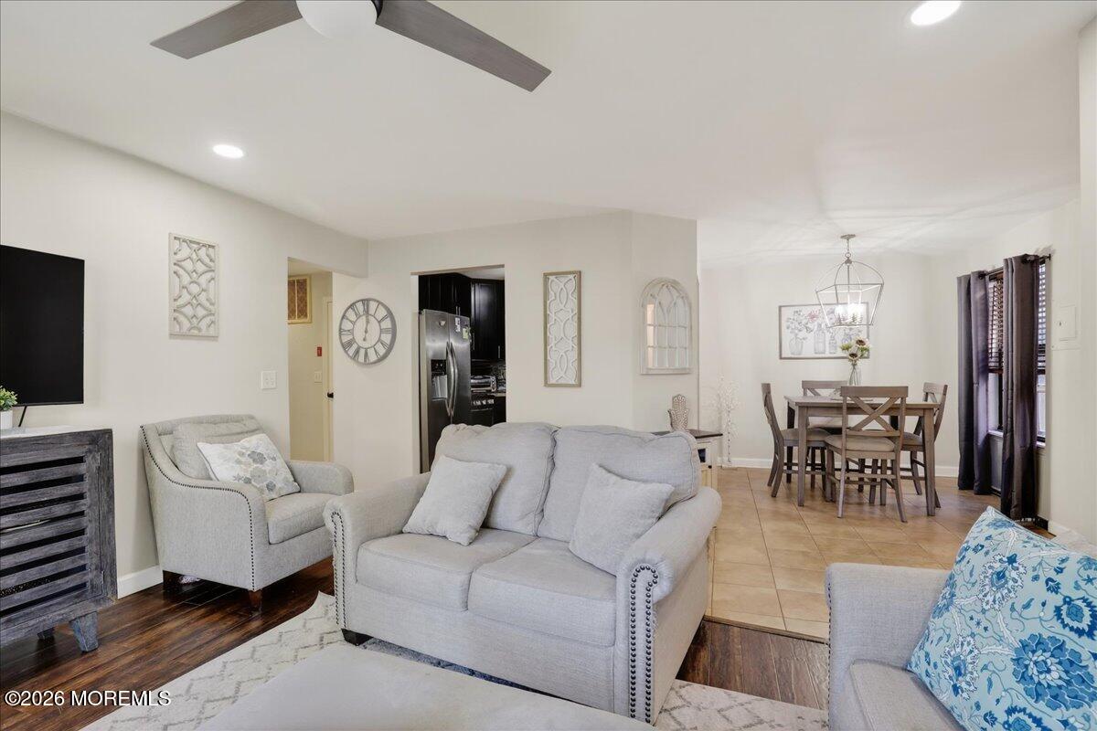 402 Daisy Court Jackson, NJ 08527 - Photo 15 of 44 a living room with furniture and a flat screen tv