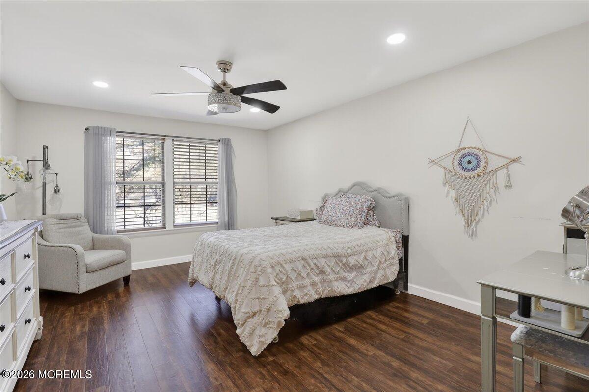 402 Daisy Court Jackson, NJ 08527 - Photo 18 of 44 a bedroom with a bed and wooden floor