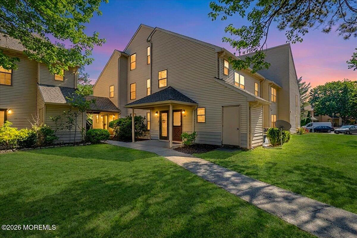402 Daisy Court Jackson, NJ 08527 - Photo 2 of 44 a front view of a house with garden
