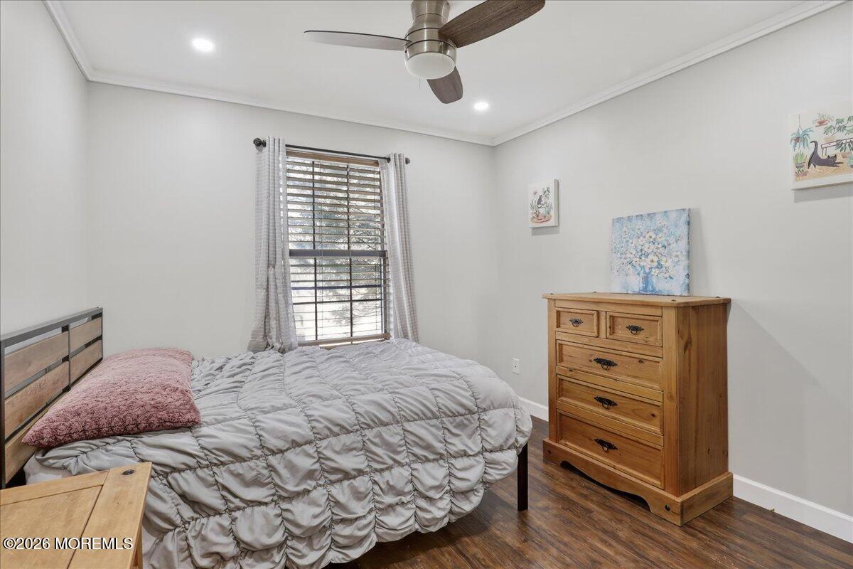 402 Daisy Court Jackson, NJ 08527 - Photo 24 of 44 a bedroom with a bed and a dresser