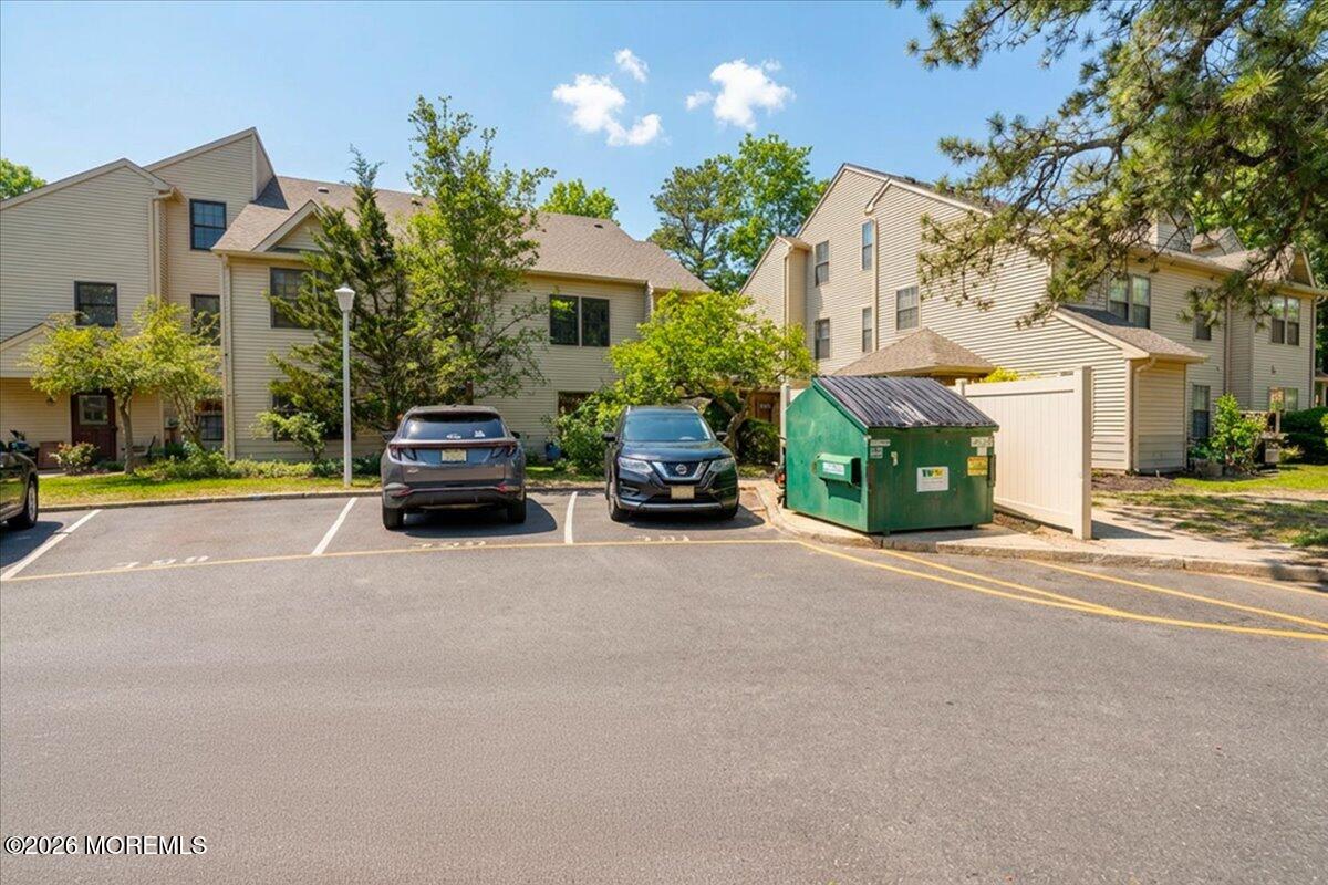 402 Daisy Court Jackson, NJ 08527 - Photo 32 of 44 a car parked in front of a building