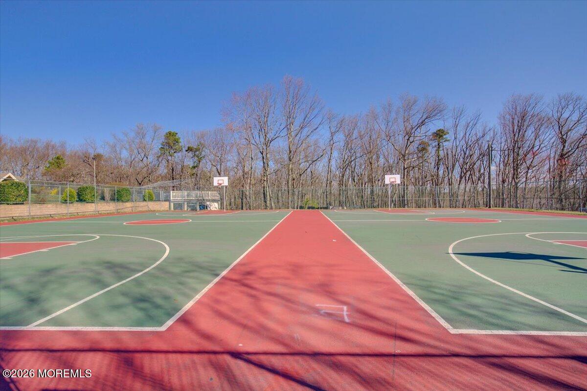 402 Daisy Court Jackson, NJ 08527 - Photo 38 of 44 a view of a playground with basketball court