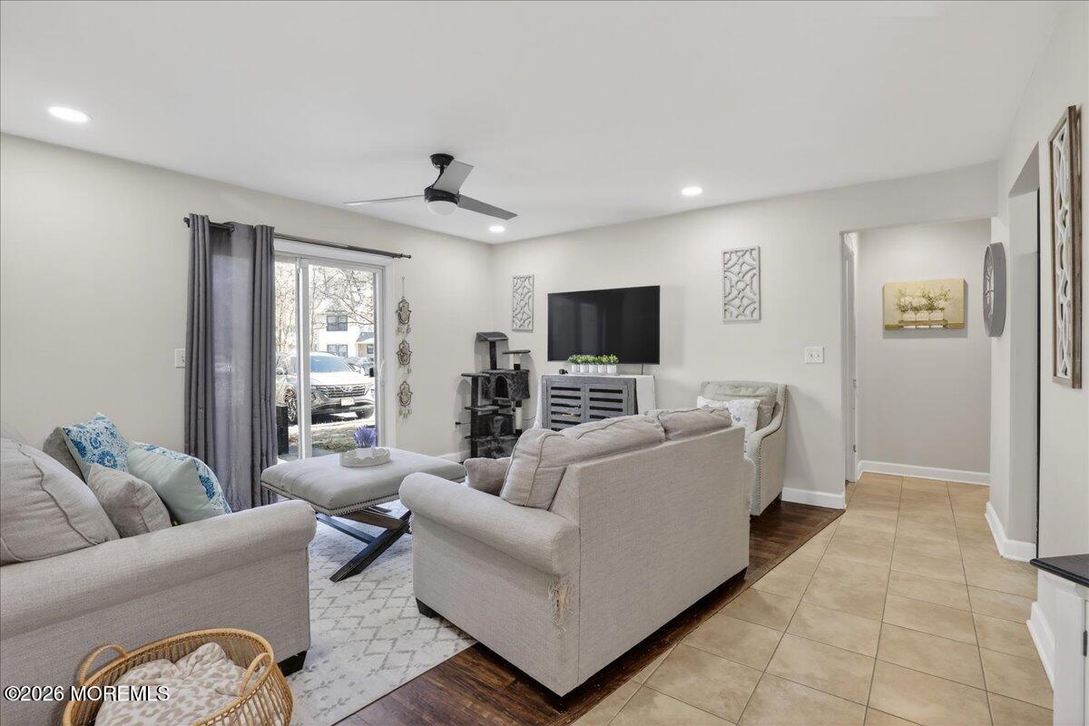 402 Daisy Court Jackson, NJ 08527 - Photo 10 of 44 a living room with furniture and a flat screen tv