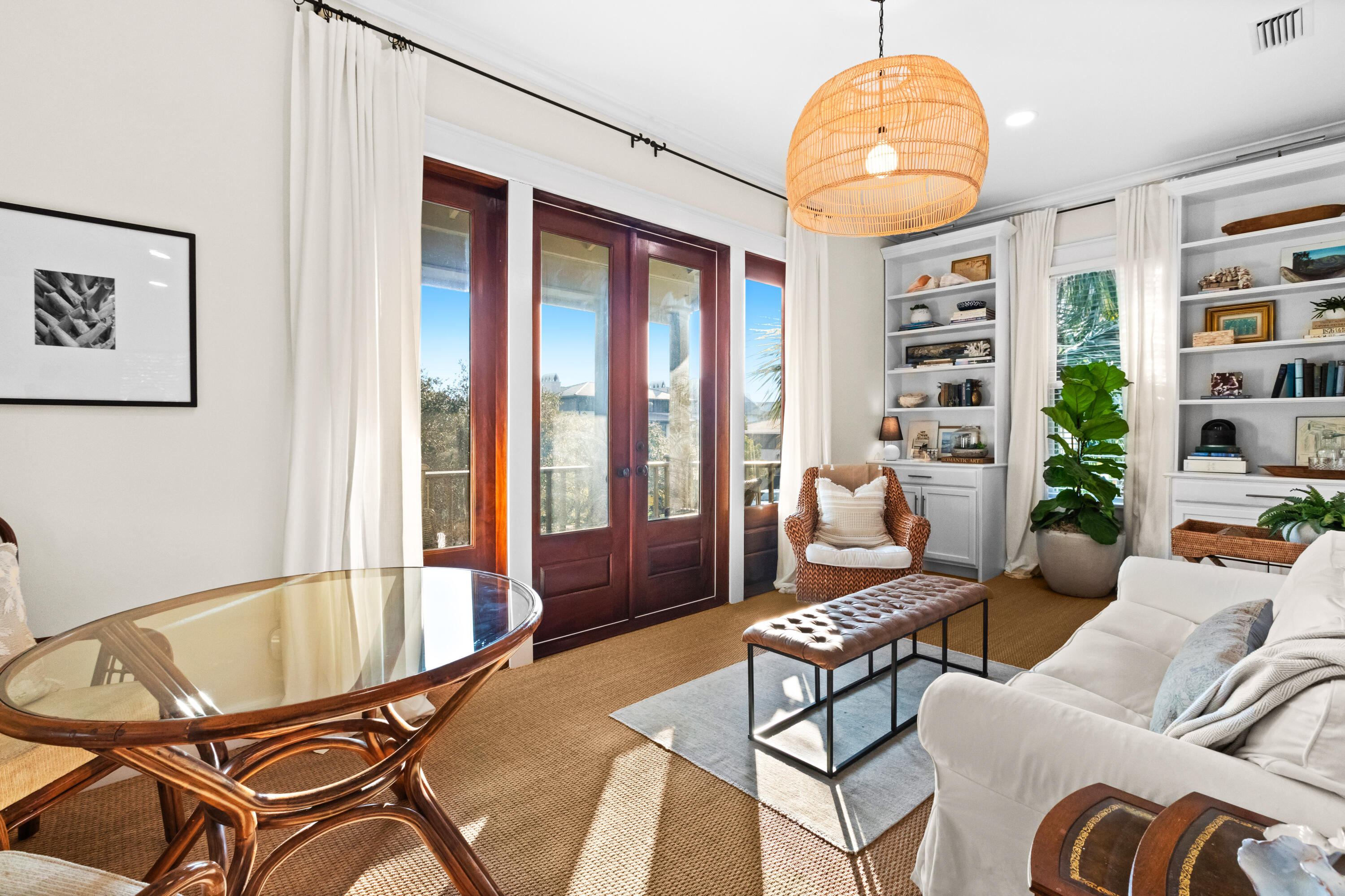 89 Sienna Court Santa Rosa Beach, FL 32459 - Photo 33 of 65 a living room with furniture a dining table and a large window