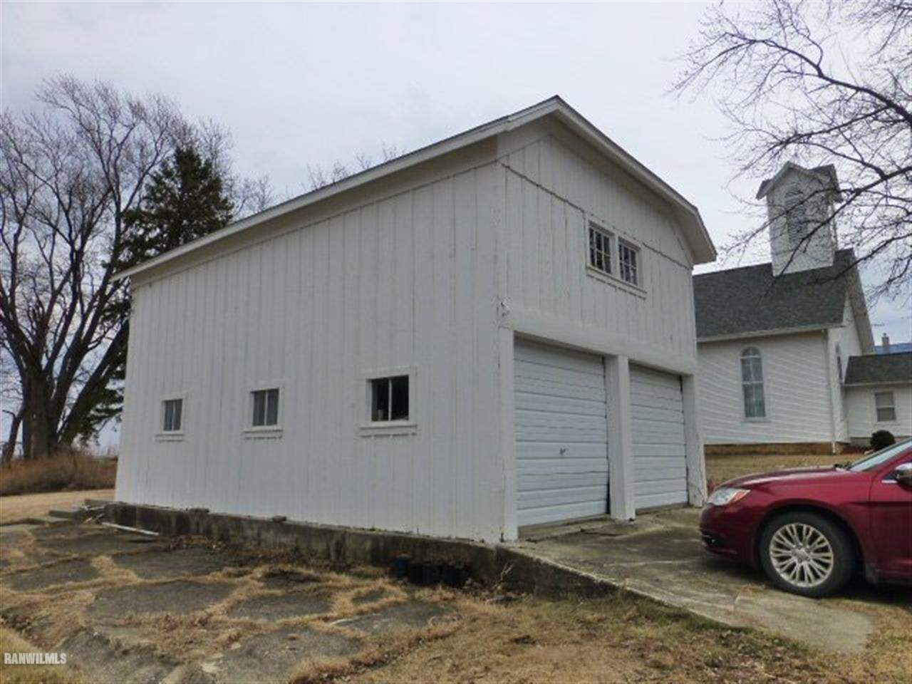 857 North Kent Road Kent, IL 61044 - Photo 17 of 19 a front view of a house