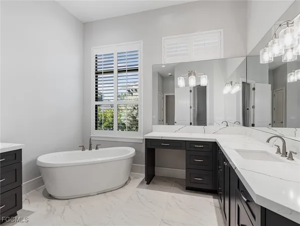 a view of a large tub and sink