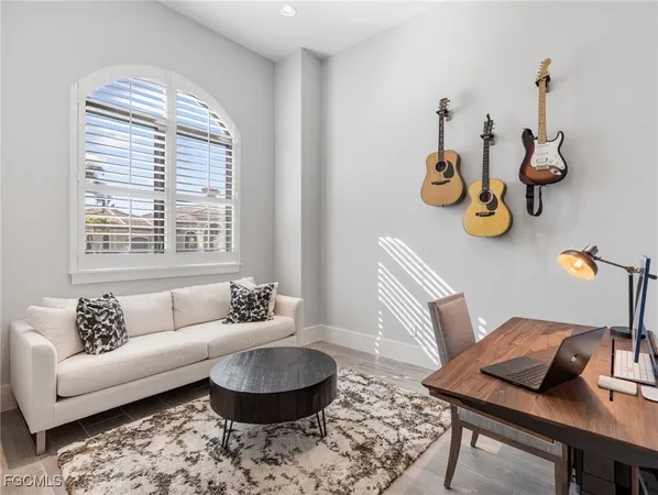 a living room with furniture and window