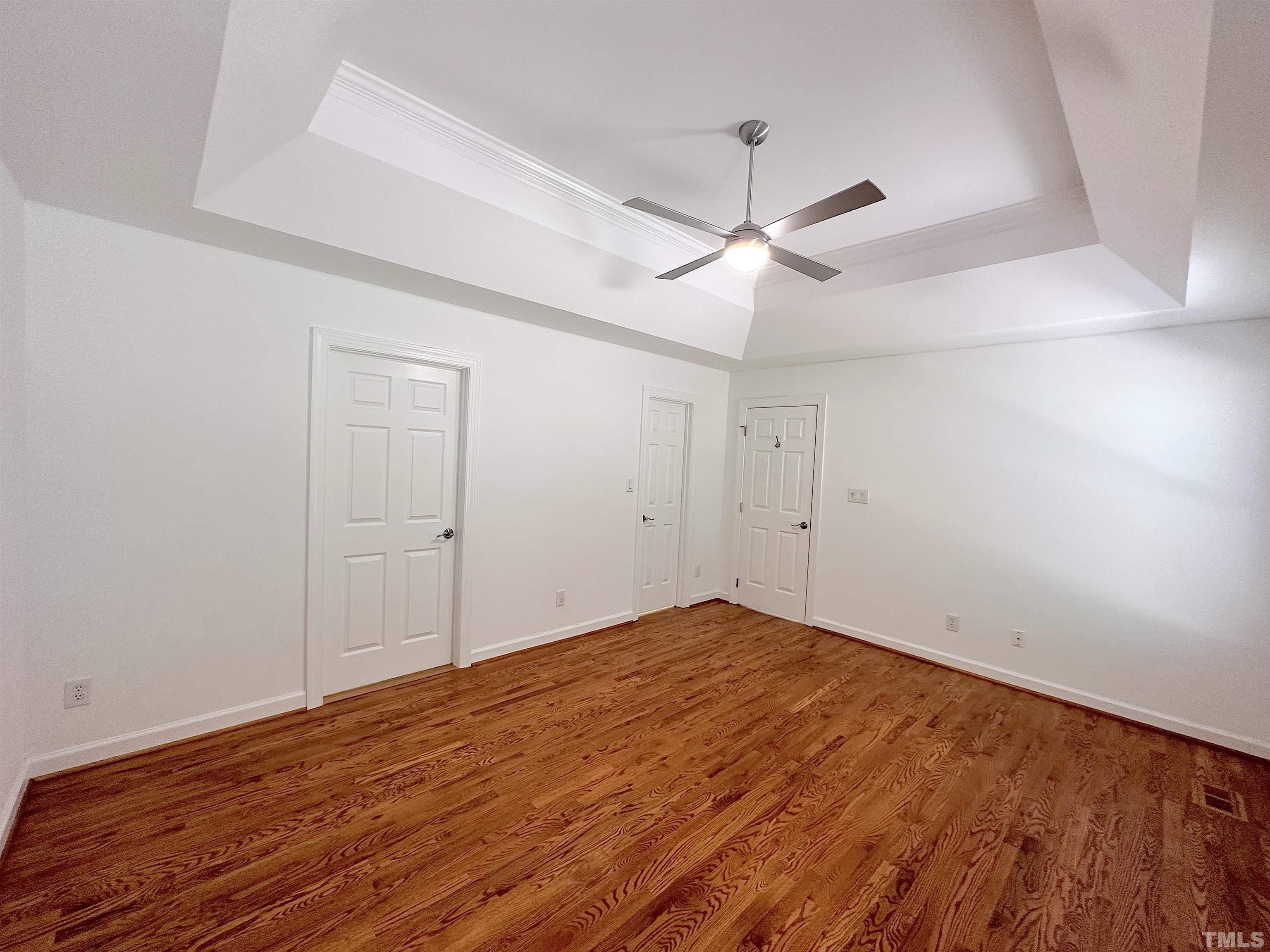 105 Wagon Trail Drive Cary, NC 27513 - Photo 12 of 22 a view of empty room with wooden floor