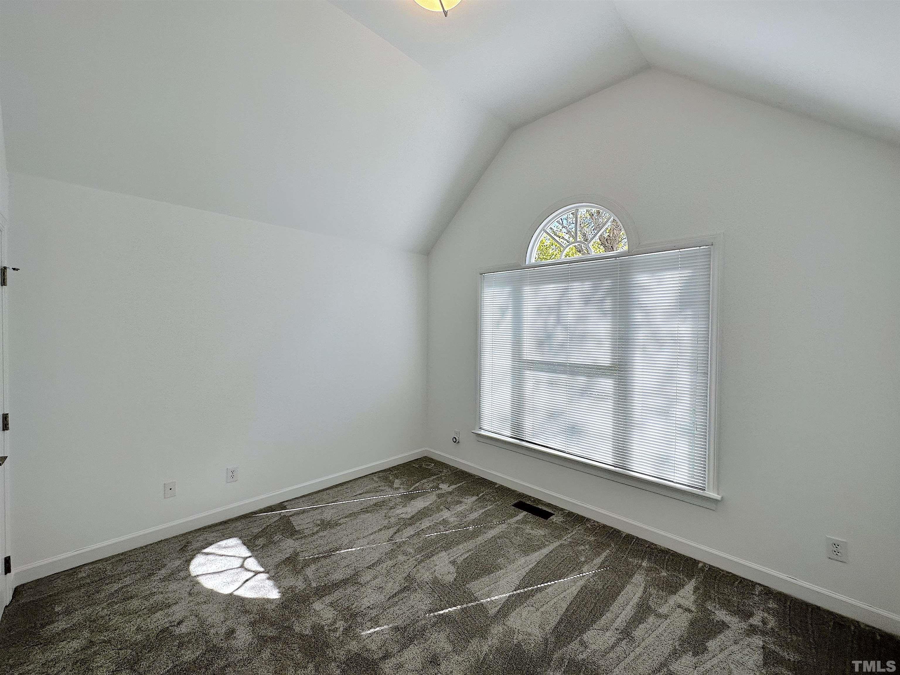 105 Wagon Trail Drive Cary, NC 27513 - Photo 15 of 22 an empty room with windows