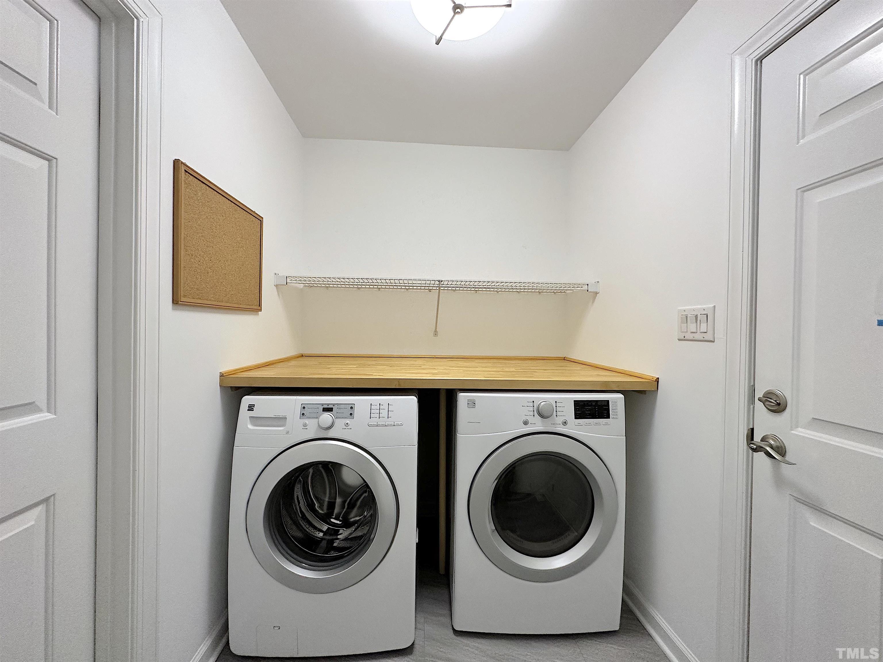105 Wagon Trail Drive Cary, NC 27513 - Photo 20 of 22 a utility room with dryer and washer